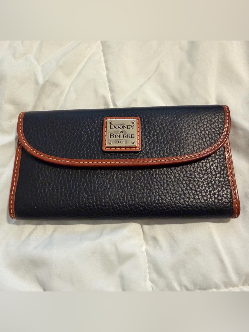 Dooney & Bourke Black Leather Tri-Fold Wallet with Brown Trim